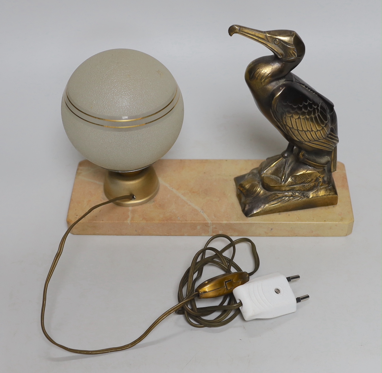 M. Frecourt: A French Art Deco spelter figural bird table lamp, 25cm wide, 19.5cm high